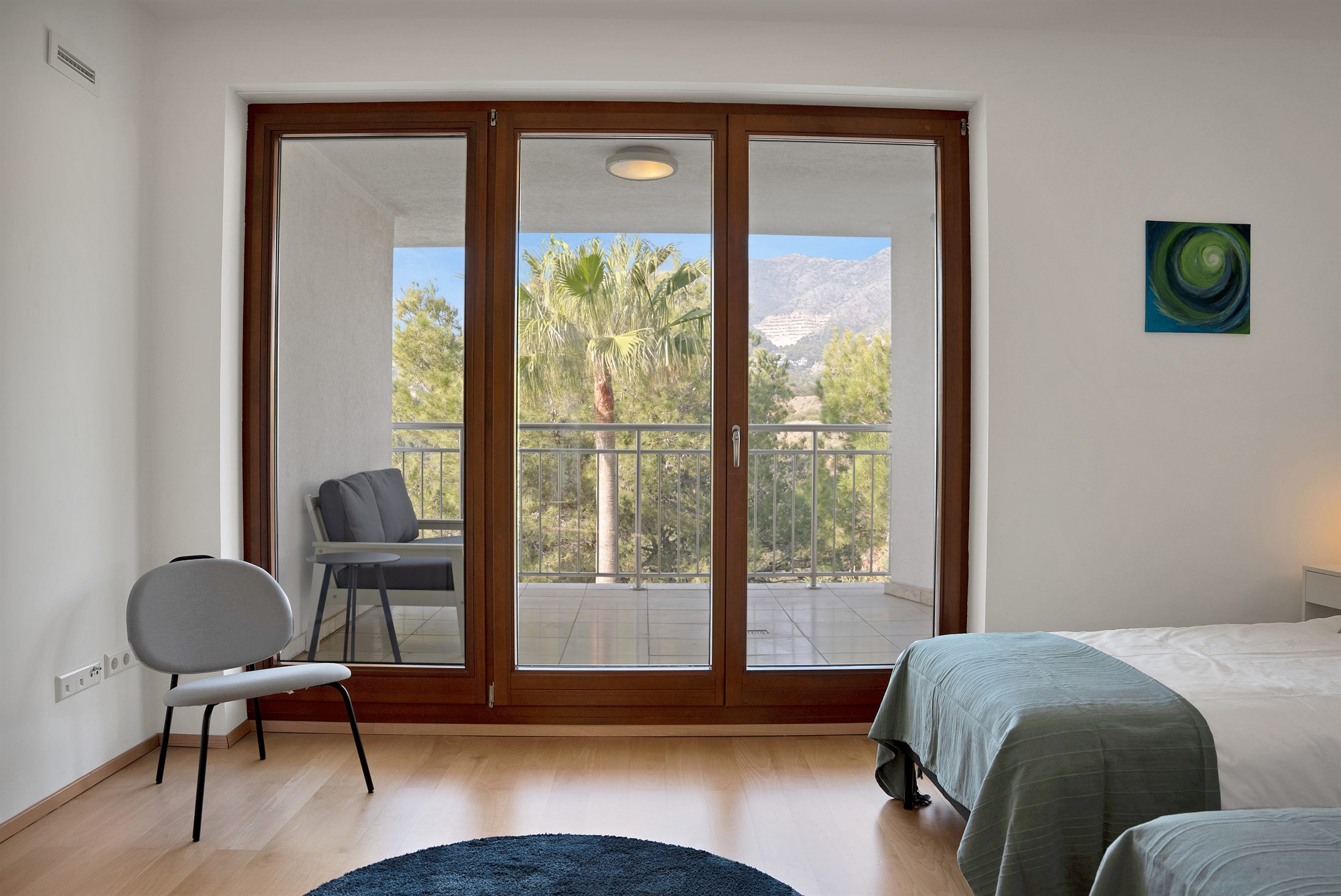 Bedroom with private balcony doors