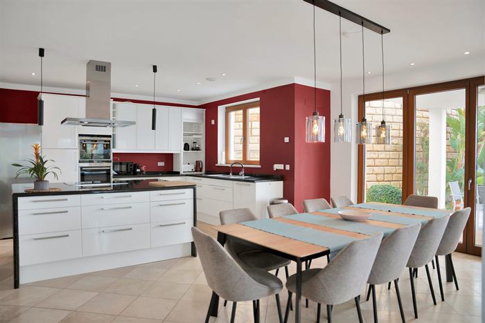 Open-plan kitchen and dining area