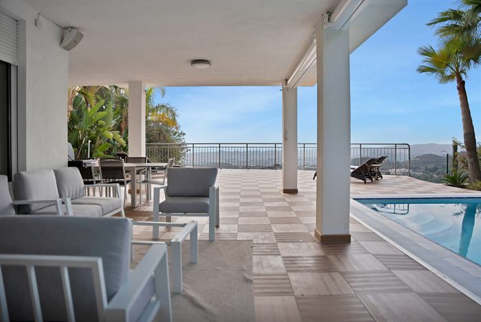 Living and dining area opening to the terrace